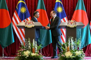 Bangladesh's Prime Minister Tarique Rahman and  Prime Minister Datuk Seri Anwar Ibrahim shake hands during a press conference in Putrajaya. -REUTERS PIC