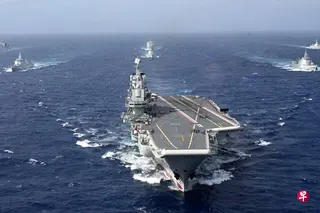中国海军辽宁舰编队完成远海实战化训练，星期一（6月22日）返回青岛母港。图为2024年10月下旬，辽宁舰编队开展远海实战化训练照片。 （中新社）