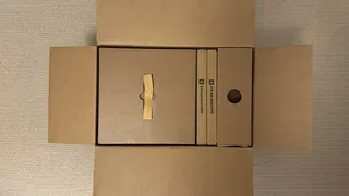 Photograph of the Steam Machine boxes as they arrive for shipping, outer box only opened, top down