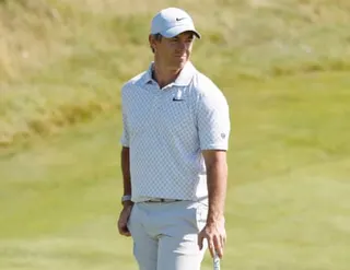 Rory McIlroy waits to putt on the 18th green during the final round of the US Open Golf Championship at Shinnecock