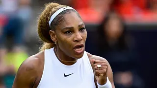 Serena Williams celebrates during a doubles match at the Berlin Open