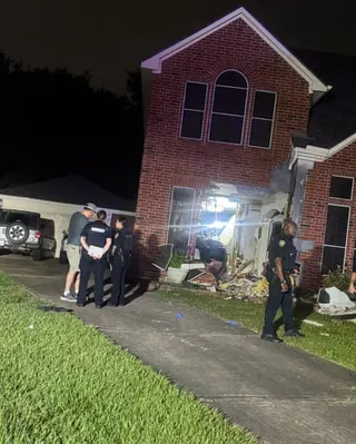 police standing by a house