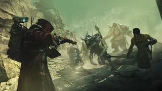 Darktide Skitarii aiming at a Packmaster and dogs
