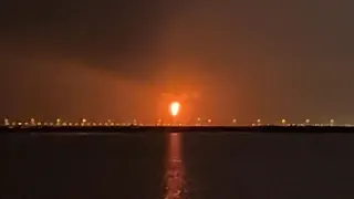 An explosion in Qatar's Ras Laffan industrial zone lighting up the night sky orange