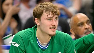Cooper Flagg sitting on the bench