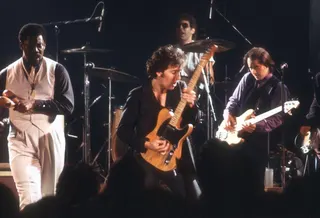 Bruce Springsteen gambols around the stage in the 1970s