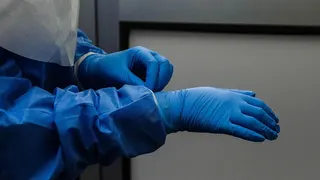 A person wearing blue protective gear