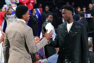 NEW YORK, NEW YORK - JUNE 23: AJ Dybantsa is congratulated by Chris Cenac Jr. after he is drafted first overall by the Washington Wizards during Round One of the 2026 NBA Draft at Barclays Center on June 23, 2026 in New York City. Arturo Holmes/Getty Images/AFP (Photo by Arturo Holmes / GETTY IMAGES NORTH AMERICA / Getty Images via AFP)