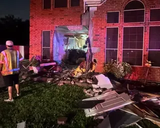 a car crashed in a building