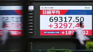 Asian stocks leap, currencies rise as Trump says Hormuz will reopen