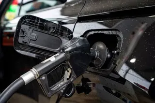 a gas pump in a car