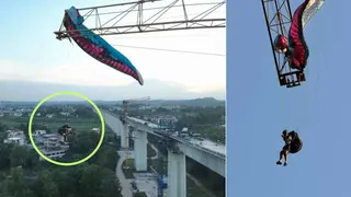 突遇乱流失控 中国滑翔伞男子悬挂塔吊60米高空数小时