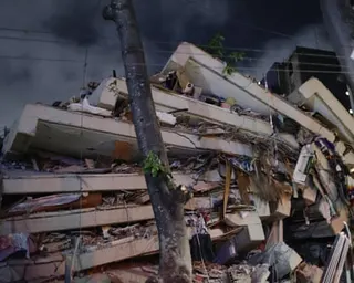 A collapsed apartment building in Los Palos Grandes.