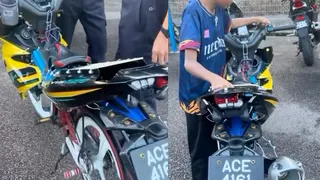 把脚踏车改装成摩托车模样 马国小男孩创意引网民点赞