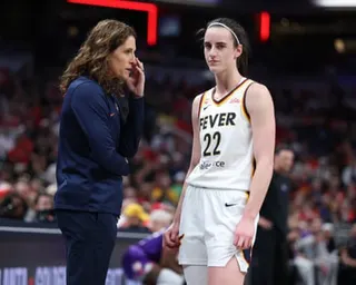 Stephanie White and Caitlin Clark talk during the Fever’s Wednesday night loss to the Mercury.