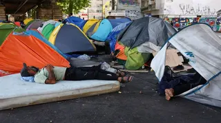 Migrants left to endure deadly Paris heat with little shelter or aid