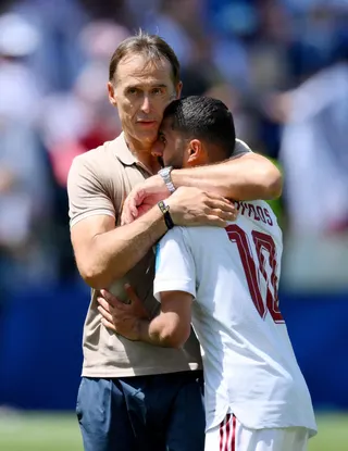 Soccer Football - FIFA World Cup 2026 - Group B - Bosnia and Herzegovina v Qatar - Seattle Stadium, Seattle, Washington, U.S. - June 24, 2026
Qatar's Hassan Alhaydos and coach Julen Lopetegui look dejected after the match IMAGN IMAGES via Reuters/Steven Bisig     TPX IMAGES OF THE DAY