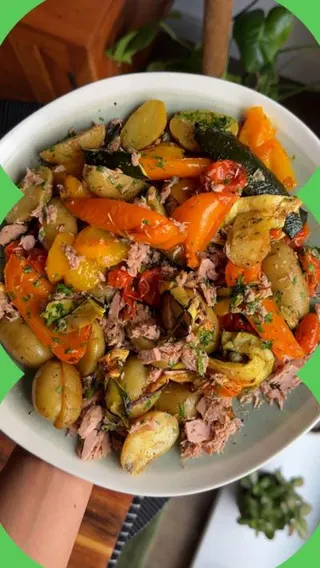 Tuna potato salad on a white plate from above