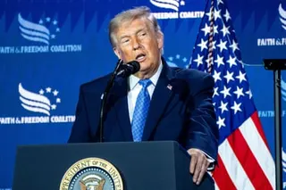 a man in front of a microphone