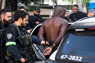 Brazilian Special Police forces arrest a suspect linked to the Comando Vermelho drug trafficking organisation at the Santa Marta favela, in Rio de Janeiro, Brazil, on June 23, 2026. — AFP pic
