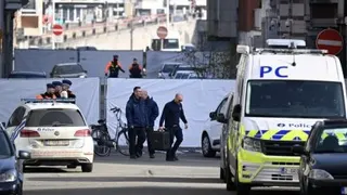 3月9日，警员在比利时列日市一家遭到爆炸袭击的犹太教堂展开调查。（法新社档案照）
