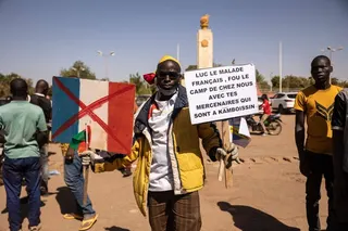 A man holds a placard during a protest to support the Burkina Faso President Captain Ibrahim Traore and to demand the departure of France’s ambassador and military forces, in Ouagadougou in January 2023. Photo: AFP