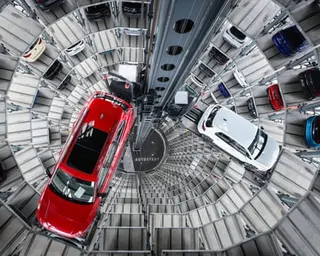 VW Passat R and a Golf GTI are pictured in the tower storage facility of German carmaker Volkswagen