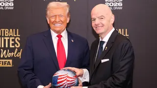 US president Donald Trump and Fifa president Gianni Infantino holding a football