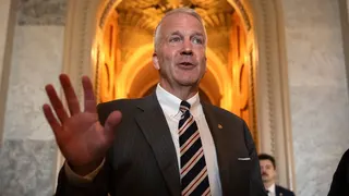 Sen. Dan Sullivan speaking to reporters at the Capitol in Washington