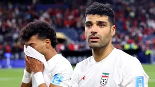 Ramin Rezaeian and Mehdi Taremi of Iran deflated after draw with Egypt at 2026 World Cup