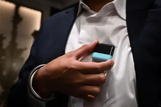 Dr Gurpreet Singh, founder & CEO, Respiree showing where the Respiree device is worn during the Singapore Medical Device Showcase on June 29.