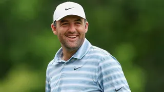 Scottie Scheffler smiles during the second round of the Travelers Championship in 2026