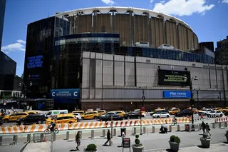 People walk past Madison Square Garden in Manhattan, in New York City, U.S., June 24, 2026.   REUTERS/Vincent Alban