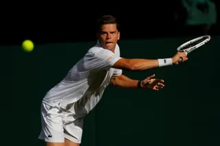 Alexander Blockx returns a shot