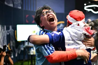 Football fans react after Japan scored at the public viewing for the 2026 World Cup Group F football match between Japan and Brazil in Tokyo early on June 30, 2026. (Photo by Philip FONG / AFP)