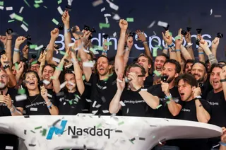 Matteo Danieli, co-founder of Bending Spoons, center, rings the opening bell during the Bending Spoons initial public offering (IPO) at the Nasdaq MarketSite in New York, US, on Wednesday, July 1, 2026. Bending Spoons applies a private equity playbook to software, buying up mostly fledgling subscription-based apps, slashing headcount and handing operations to its roster of Italian engineers. Photographer: Michael Nagle/Bloomberg via Getty Images