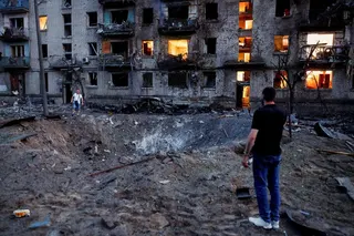 A crater from overnight Russian missile and drone strikes in Kyiv. Photo: Reuters