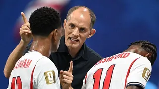 England head coach Thomas Tuchel speaks to Jude Bellingham and Marcus Rashford
