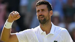 Novak Djokovic celebrates after defeating Arthur Rinderknech