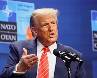 Donald Trump gesturing as he speaks at a Nato summit in The Hague, Netherlands, in June 2025