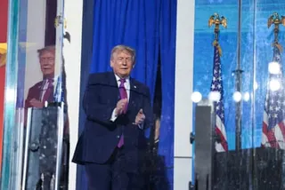 Trump arrives on stage at the rally at Mount Rushmore.