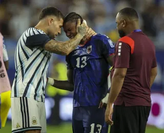 Cape Verde’s Sidny Lopes Cabral is comforted by Nicolás Otamendi after Argentina squeezed through in their last-32 tie.
