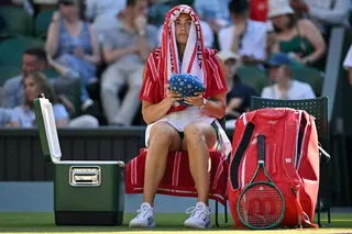 Aryna Sabalenka of Belarus uses a towel during a break in her women’s singles third round tennis match against Latvia’s Jelena Ostapenko on the fifth day of the 2026 Wimbledon Championships at The All England Lawn Tennis and Croquet Club in London on July 3, 2026. — AFP pic