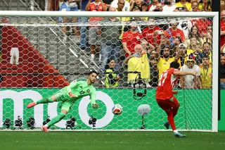Soccer Football - FIFA World Cup 2026 - Round of 16 - Switzerland v Colombia - BC Place, Vancouver, Canada - July 7, 2026 Switzerland's Ruben Vargas scores a penalty past Colombia's Camilo Vargas to win the penalty shootout REUTERS/Albert Gea