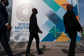 Delegates walk to the entrance of the International Monetary Fund headquarters during the World Bank/IMF Spring Meetings in Washington in April. The IMF now expects the global economy to expand by a sluggish 3 per cent in 2026, down from 3.5 per cent last year. Photo: AP