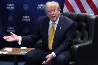 US President Donald Trump reacts.