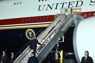 US President Donald Trump boards the new Air Force One after changing planes at Royal Air Force (RAF) Mildenhall in Mildenhall, eastern England, on July 8, 2026, before continuing his journey to the United States. Trump returns from NATO Summit in Turkey. (Photo by SAUL LOEB / AFP)