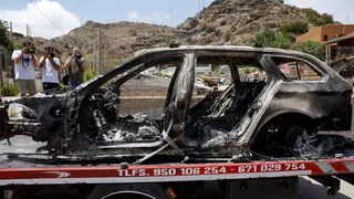 a car that burned during wildfires affecting Almeria province,