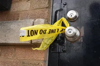 caution tape on door handle