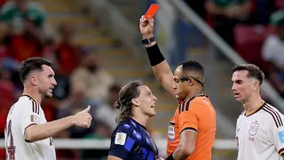 Ismail Elfath shows a red card to Agustin Canobbio